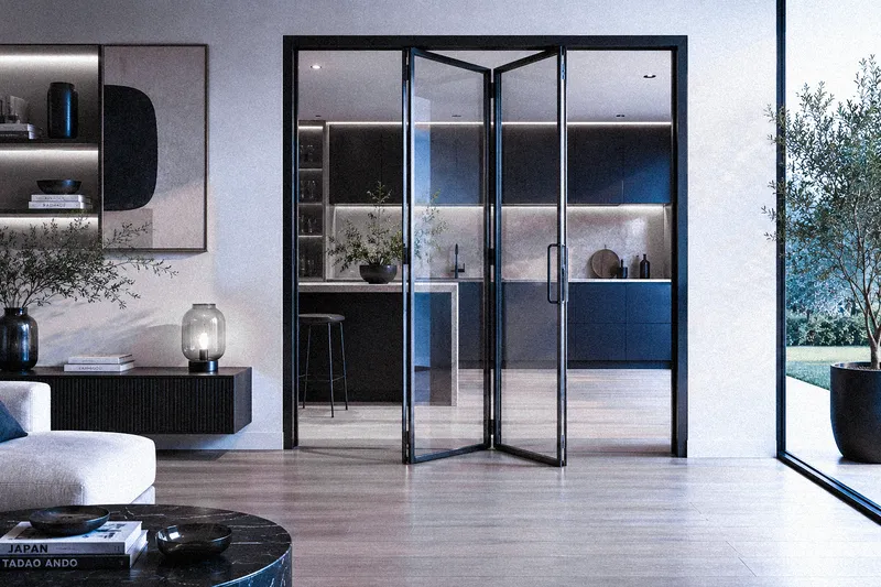 Porta a soffietto in vetro con sistema soft-close per una chiusura ammortizzata e silenziosa.